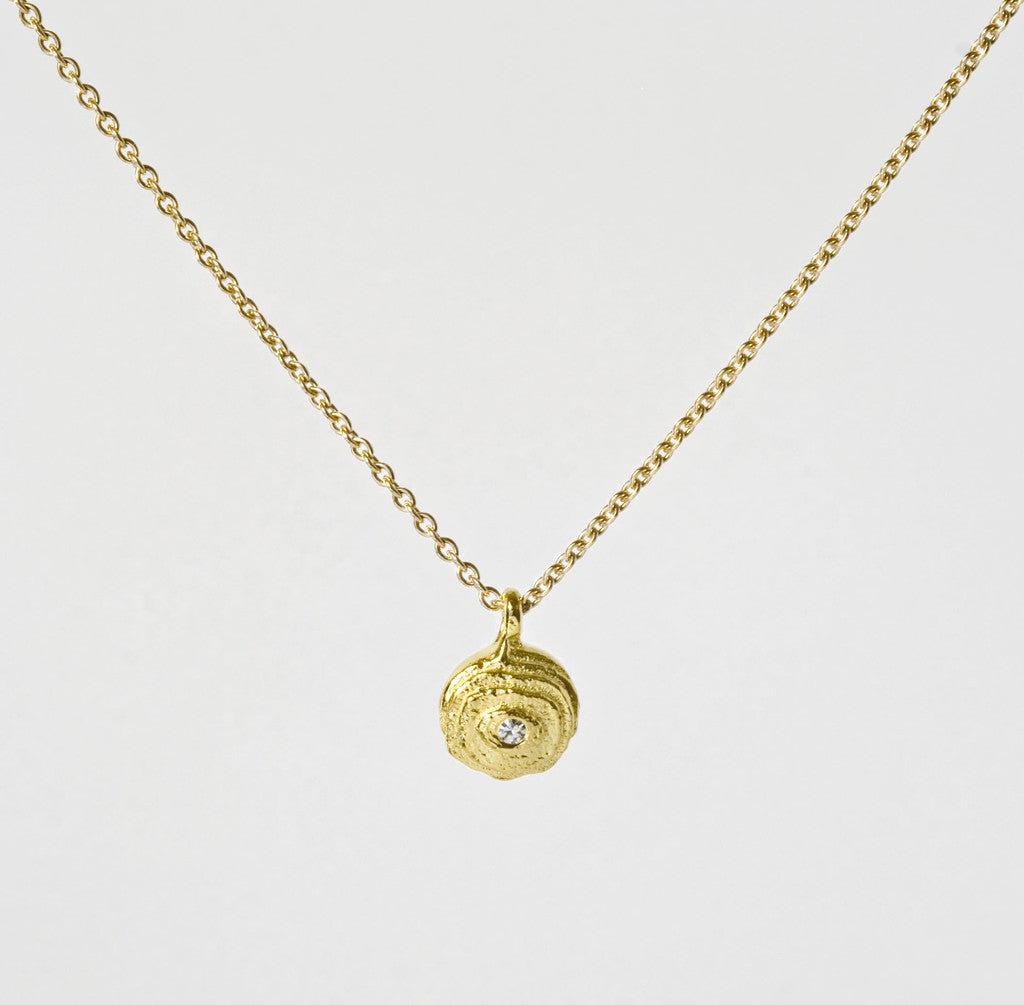Gold and diamond pendant, textured jewellery